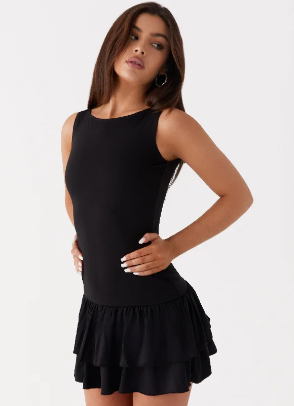 Denim skirt – Skirt made from denim fabric, often casual and versatile.Rhiannon Frill Mini Dress - Black