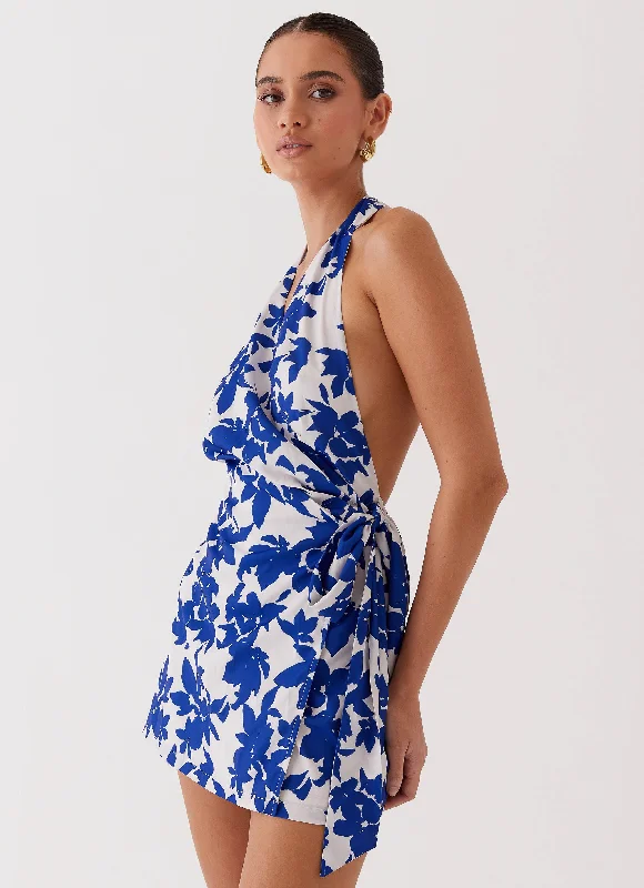 Cargo skirt – Skirt with utility-style pockets, similar to cargo pants.Street Blues Wrap Mini Dress - Blue Floral