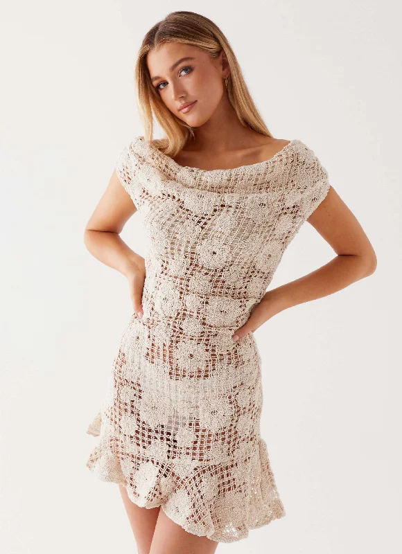 Pleated skirt – Skirt with folds or pleats, adding volume and texture to the fabric.Sunnyside Crochet Mini Dress - Ivory