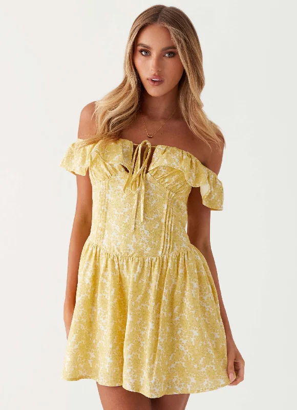 Tulle skirt – Skirt made from tulle fabric, typically voluminous and lightweight, often used for dressy or formal occasions.Tarryn Mini Dress - Yellow Floral