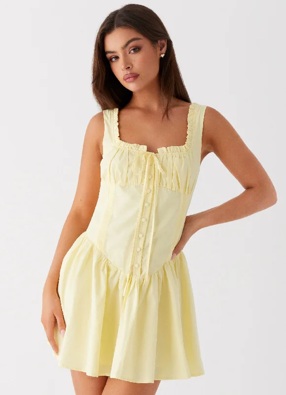 Mini skirt – Very short skirt, typically above the knee.Wren Mini Dress - Yellow