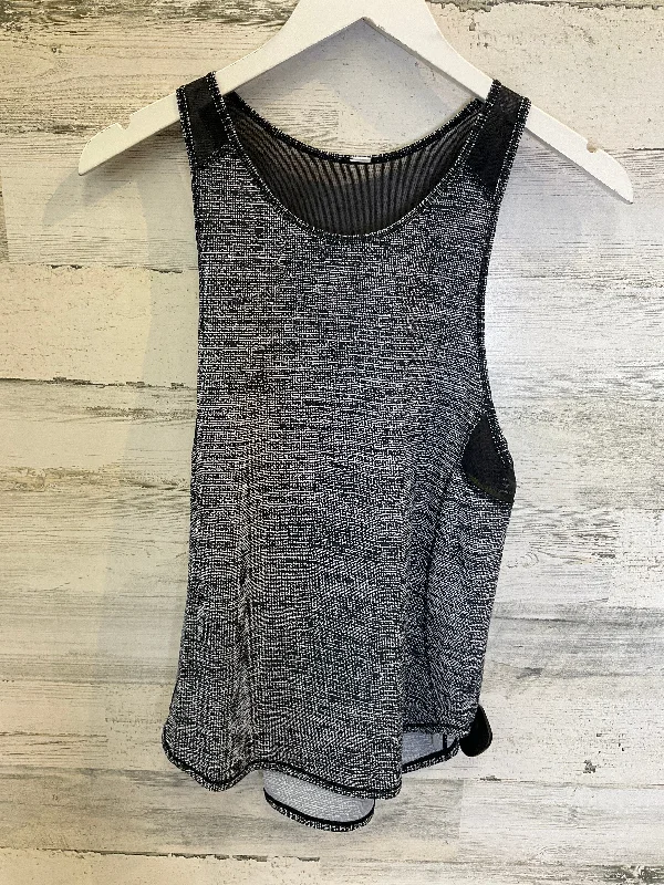 Athletic vest – Sporty, performance-focused vest, often made of breathable or moisture-wicking fabricBlack & White Athletic Tank Top Lululemon, Size S