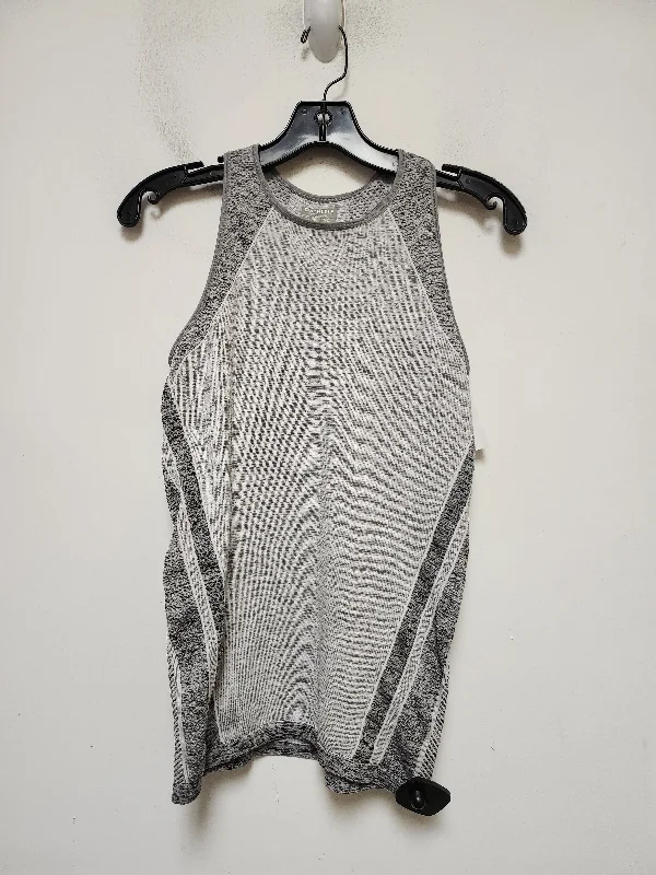 Zip-up vest – Vest that zips up the front, often with a high collarGrey Athletic Tank Top Athleta, Size Xs