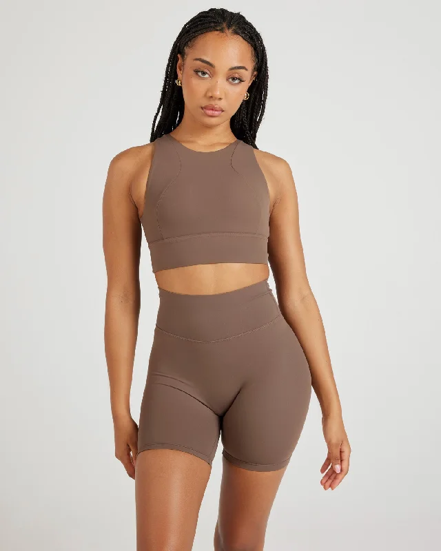 Front-closure sports bra – Sports bra that fastens at the front, often with hooks, zippers, or snaps, for easier wear.Airey Arch Bra - Light Brown