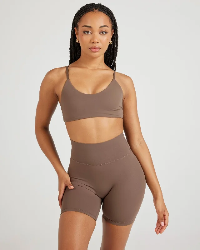 Push-up sports bra – Sports bra with added padding or structure to lift and shape the bust, providing extra support.Airey Micro Bra - Light Brown