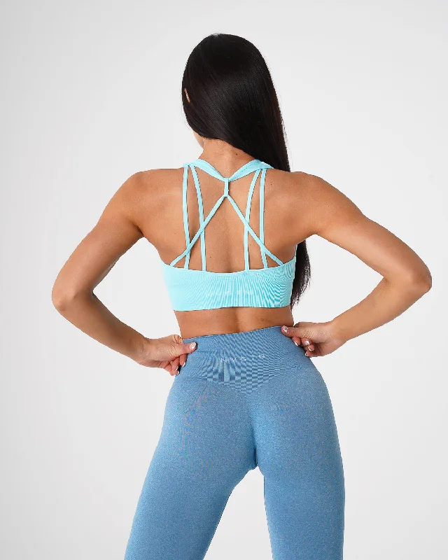 Criss-cross strap sports bra – Sports bra with straps that cross over at the back, providing extra support and a stylish look.Aqua Galaxy Ribbed Seamless Bra