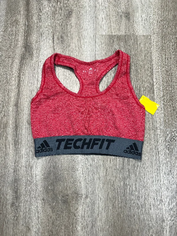 Push-up sports bra – Sports bra with added padding or structure to lift and shape the bust, providing extra support.Athletic Bra By Adidas In Red, Size: M