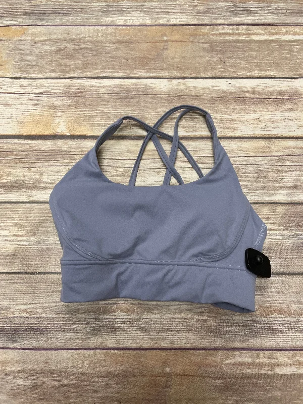 Crossover sports bra – Sports bra with a crossed strap design at the back, offering a stylish and supportive fit.Athletic Bra By Cme In Blue, Size: M