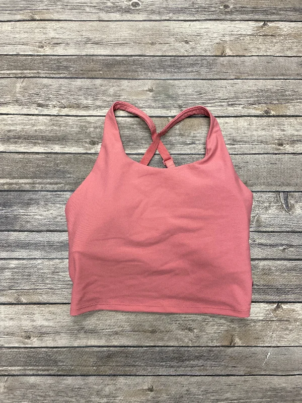 Racerback sports bra – Sports bra with a back design that features straps that meet in a "V" or "Y" shape, offering better shoulder mobility.Athletic Bra By Old Navy In Pink, Size: M