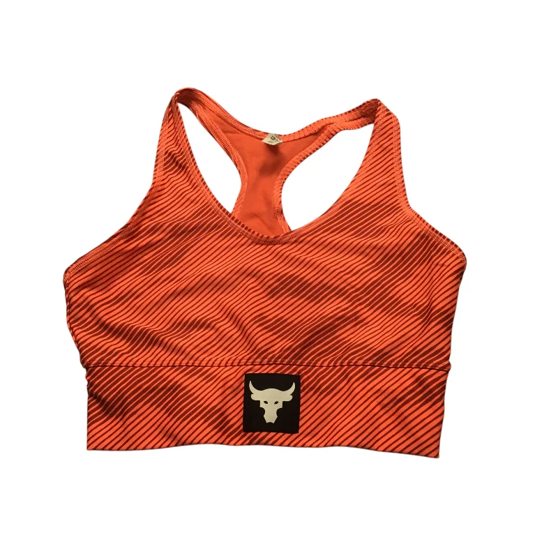 Criss-cross strap sports bra – Sports bra with straps that cross over at the back, providing extra support and a stylish look.Athletic Bra By Under Armour In Orange, Size: M