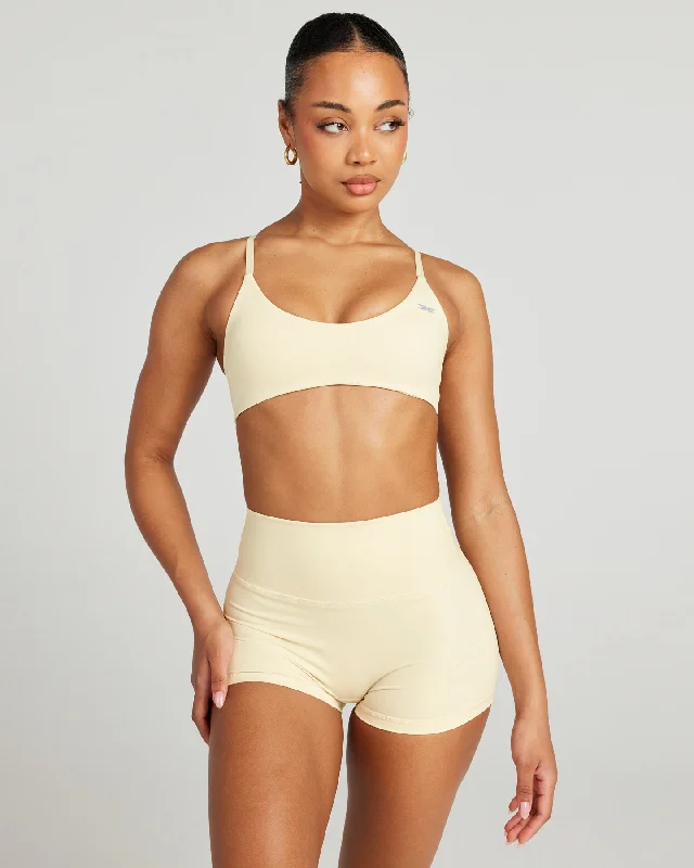 Vegan sports bra – Sports bra made from eco-friendly, cruelty-free materials, suitable for ethical consumers.Aura Lite Bra - Butter