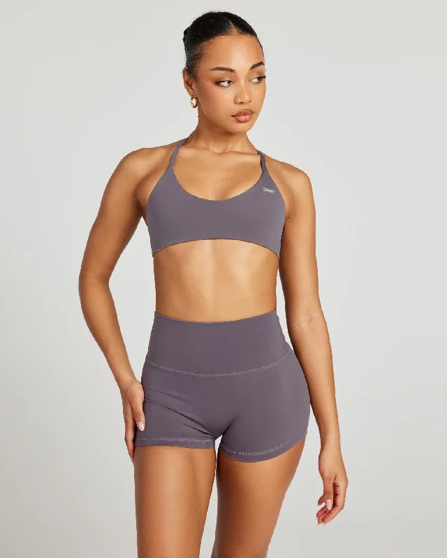 Sports bra with removable padding – Sports bra with padding that can be removed or adjusted for customized support and shape.Aura Lite Bra - Haze