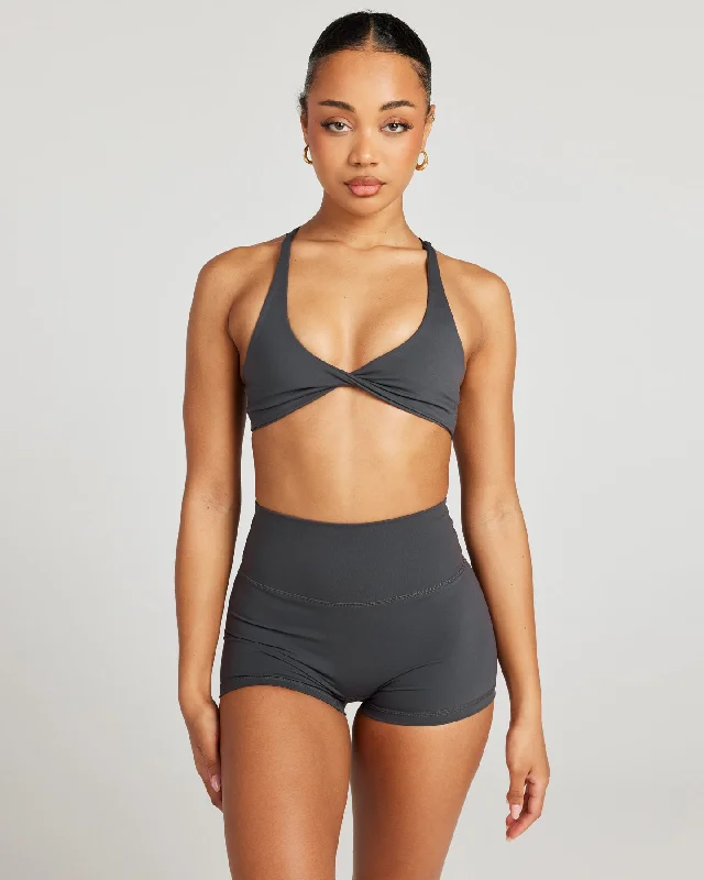 Compression tank sports bra – Combination of a tank top and sports bra, providing full coverage and support for the upper body.Aura Vantage Bra - Charcoal