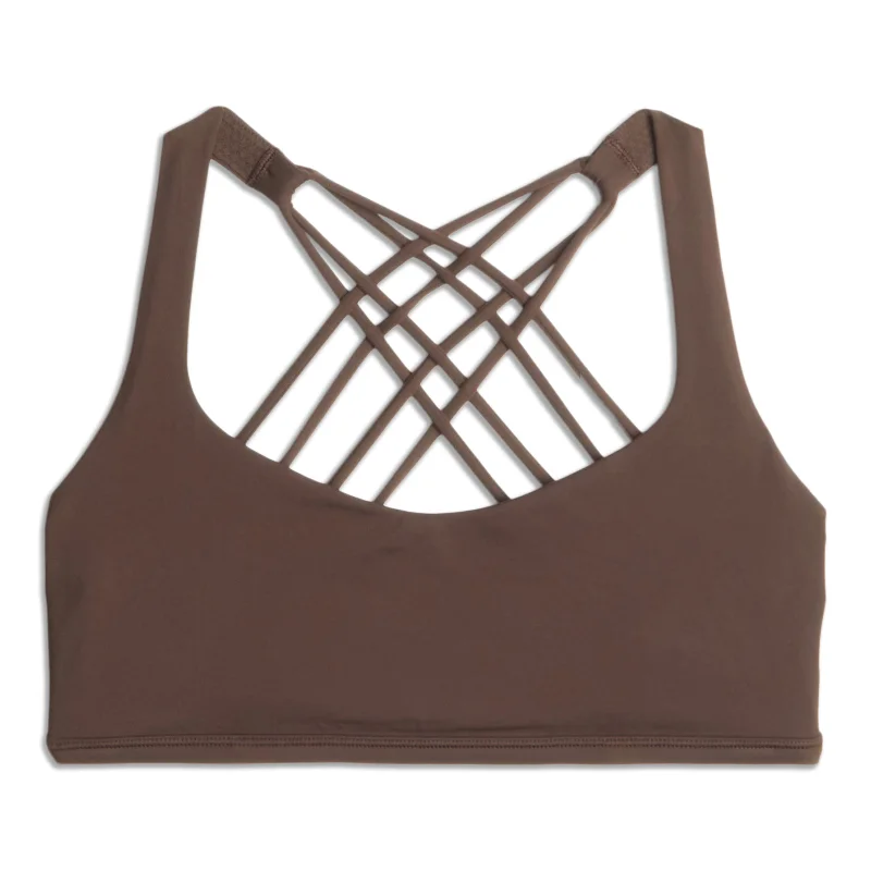 Criss-cross strap sports bra – Sports bra with straps that cross over at the back, providing extra support and a stylish look.Free To Be Bra - Wild - Resale