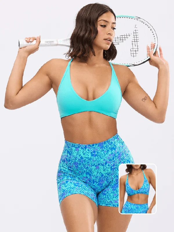 Mesh sports bra – Sports bra with mesh panels or details, promoting airflow and breathability during intense workouts.Girlfriend Reversible Sports Bra - Airhead and Blue Fashun Print