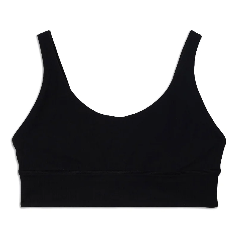 Racerback sports bra – Sports bra with a back design that features straps that meet in a "V" or "Y" shape, offering better shoulder mobility.lululemon Align™ Ribbed Bra - Resale