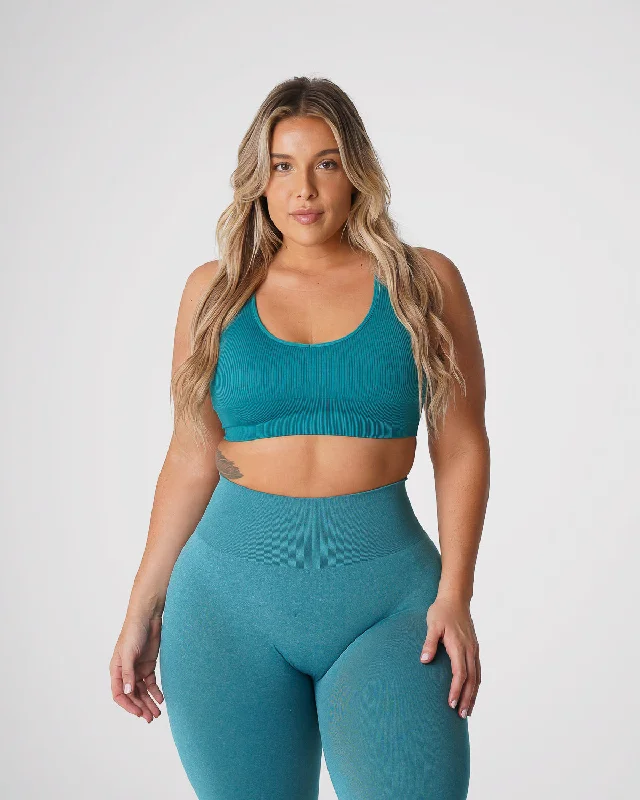 Wireless sports bra – Sports bra without underwire, offering more comfort and flexibility for a wide range of activities.Teal Galaxy Ribbed Seamless Bra