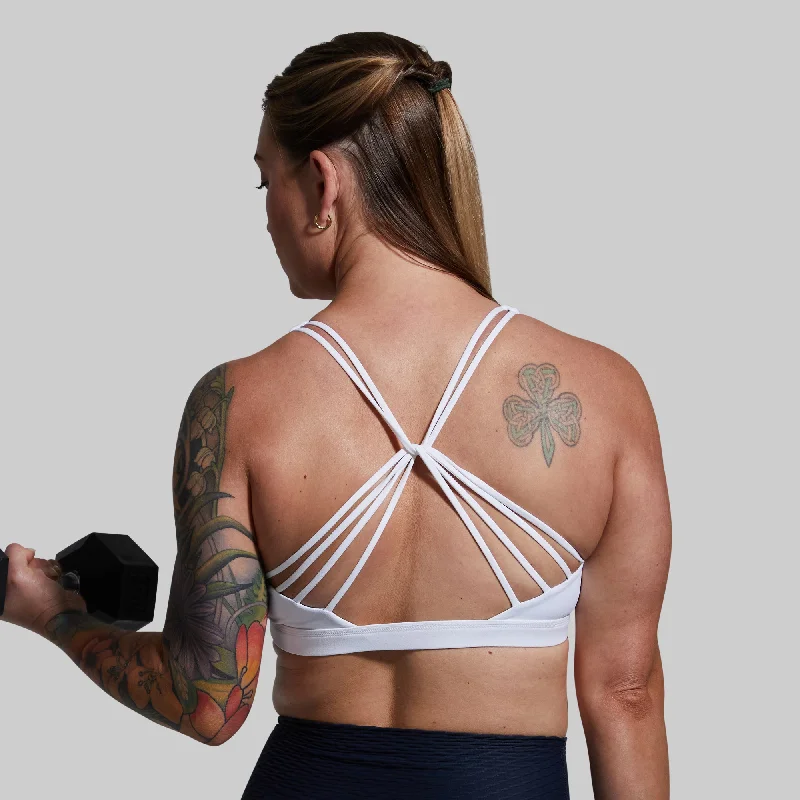 Compression sports bra – Sports bra that compresses the chest for a more secure fit and reduced bounce during high-impact activities.Vitality Sports Bra 2.0 (White)