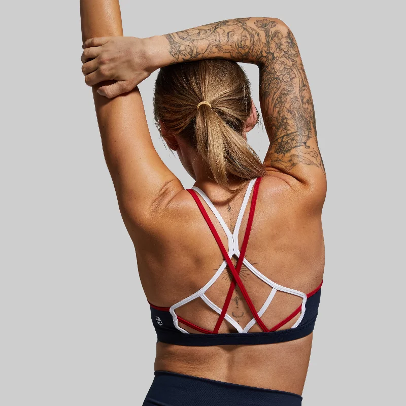 Front-closure sports bra – Sports bra that fastens at the front, often with hooks, zippers, or snaps, for easier wear.Warrior Sports Bra (Brand Strength-Navy)