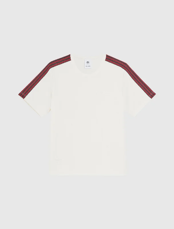 Plain/basic – Solid color, no graphics or designsWALES BONNER STRIPE T-SHIRT