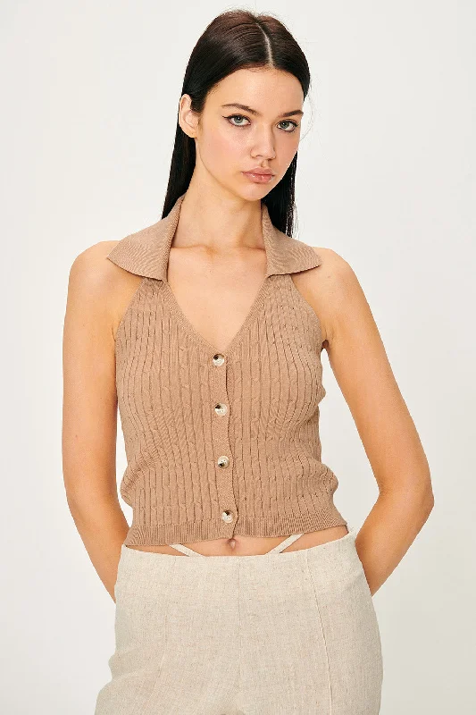 These keywords help define the specific style or feel of a sweater, allowing for more targeted searches or descriptions. Are you looking for a particular sweater style or just exploring different options?Avery Knitted Halter Neck Top