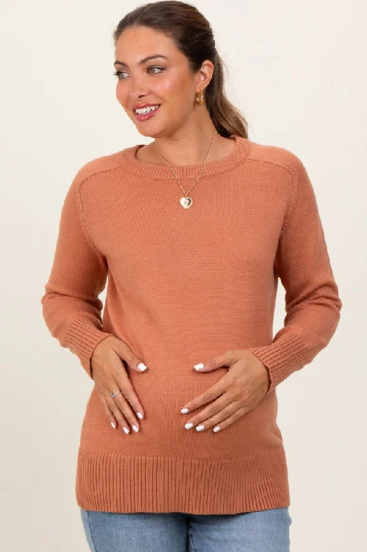 These keywords help define the specific style or feel of a sweater, allowing for more targeted searches or descriptions. Are you looking for a particular sweater style or just exploring different options?Peach Basic Relaxed Fit Maternity Sweater