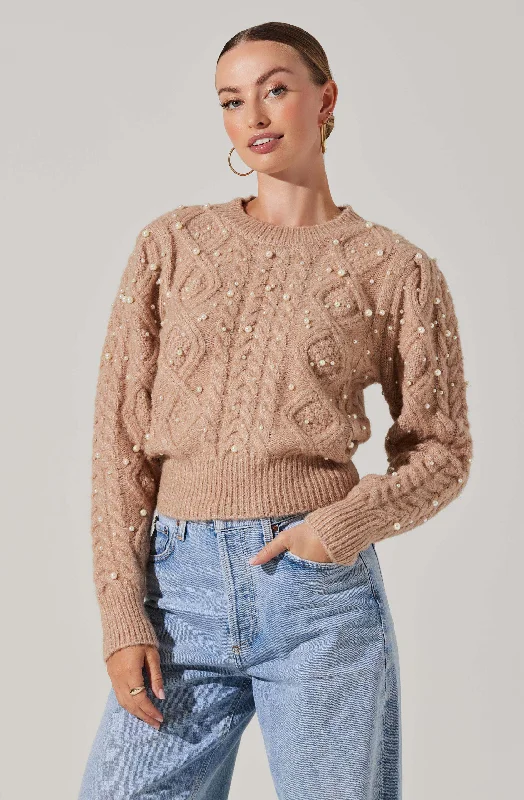 Raglan sleeve – Diagonal sleeve seams that extend to the necklinePearl Embellished Sweater