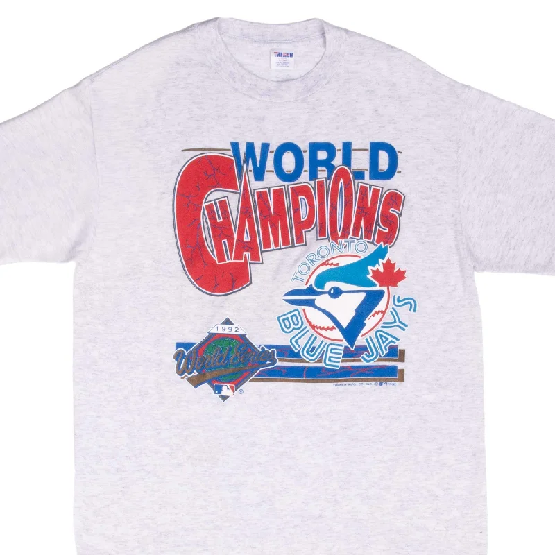 Fitted – Snug, form-fitting styleVINTAGE MLB TORONTO BLUE JAYS WORLD CHAMPIONS 1992 TEE SHIRT LARGE MADE USA