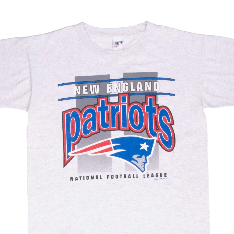 Graphic tee – T-shirt with printed designs, logos, or imagesVINTAGE NFL NEW ENGLAND PATRIOTS 1995 GREY TEE SHIRT LARGE