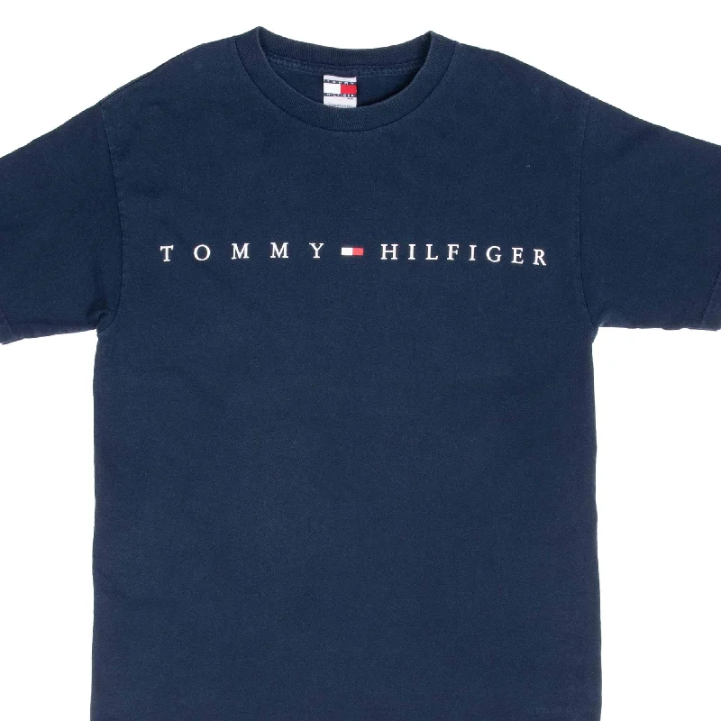 Tie-dye – Colorful, patterned T-shirt created with a tie-dye techniqueVINTAGE TOMMY HILFIGER SPELLOUT NAVY BLUE TEE SHIRT 1990S MEDIUM